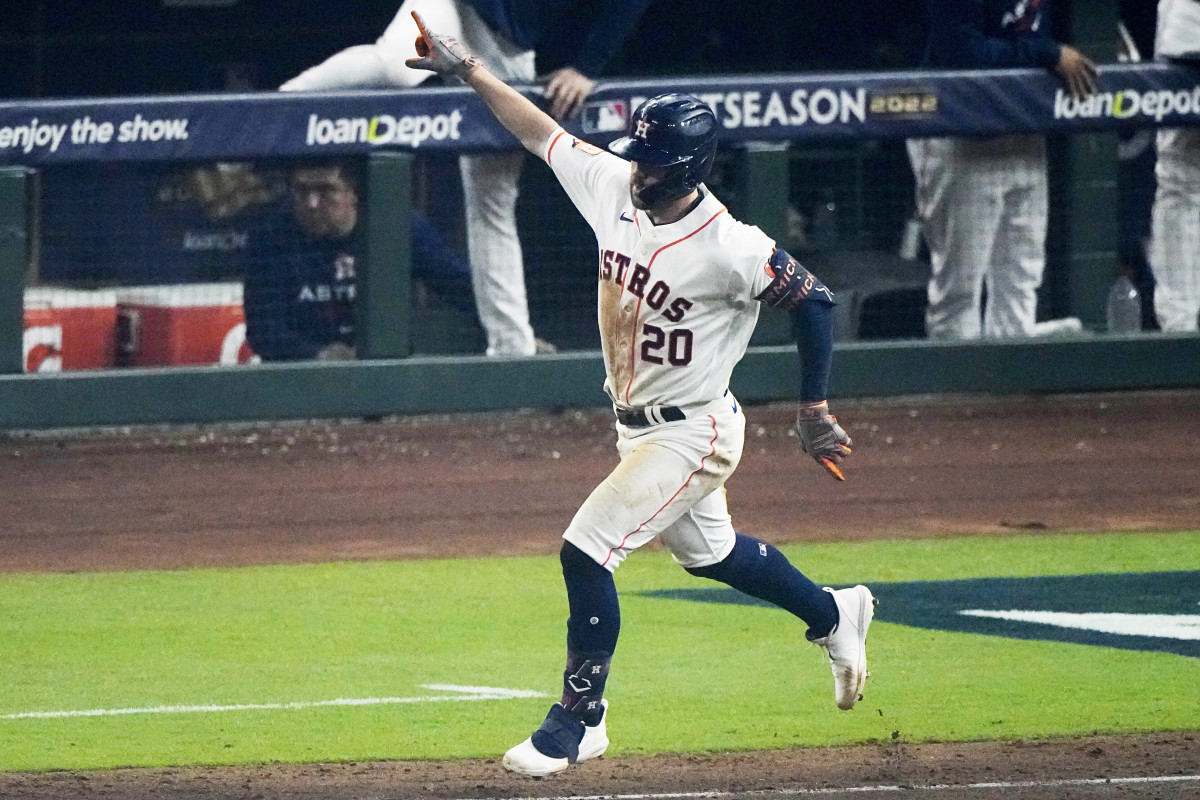 Chas McCormick is elated as he rounds first base after hitting a solo home run.